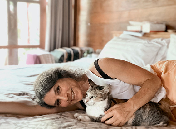 Profile photo of Little School of Reiki, Reiki Master Teacher, Kate Parrott with her cat in Ubud Bali
