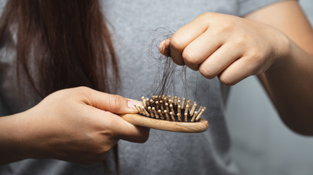 Notice More Hair Falling Out Than Normal? It Could Be Seasonal Hair Shedding.