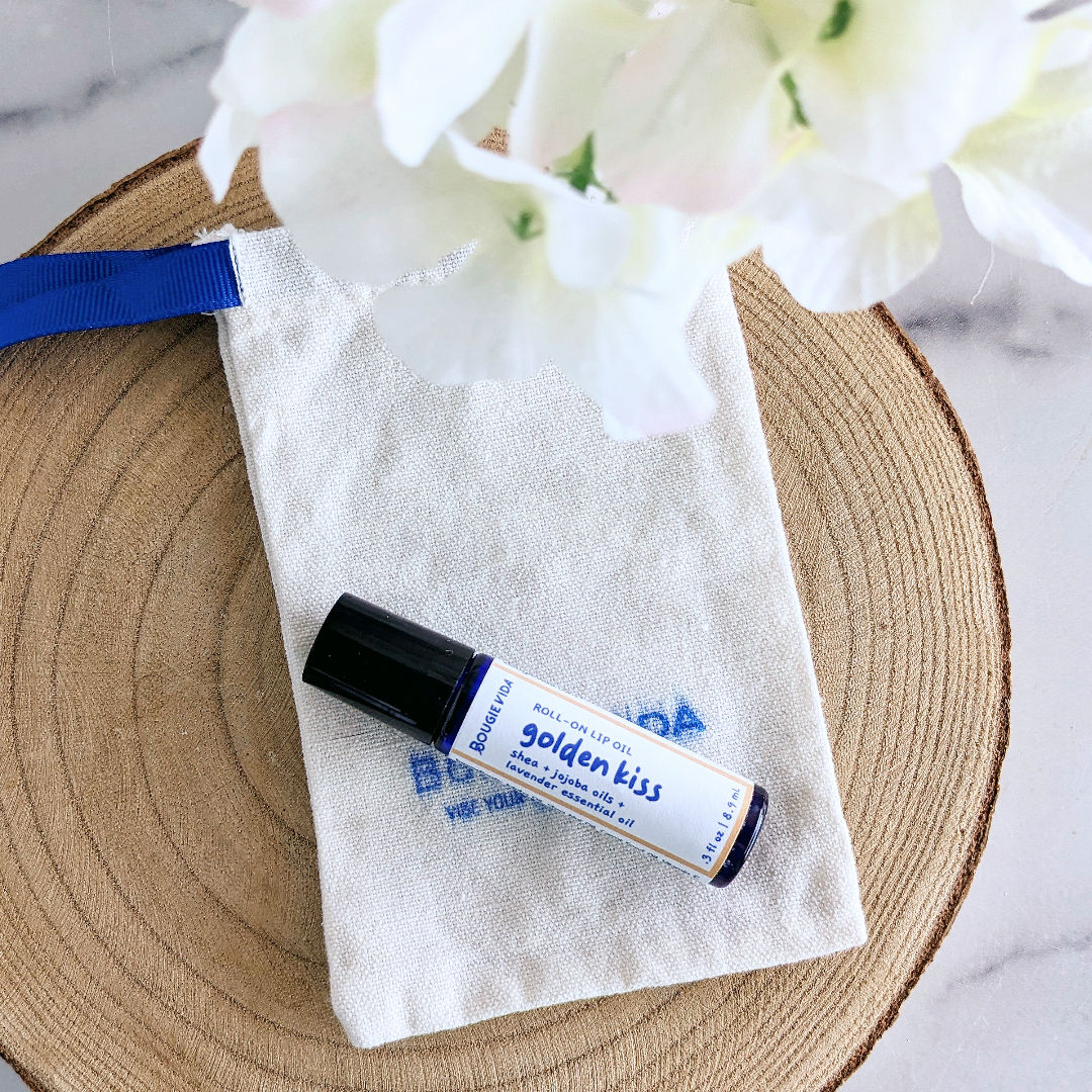 Golden Kiss roll-on lip oil packaging view