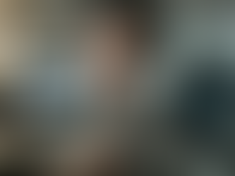 Man staring down the barrel of a gun