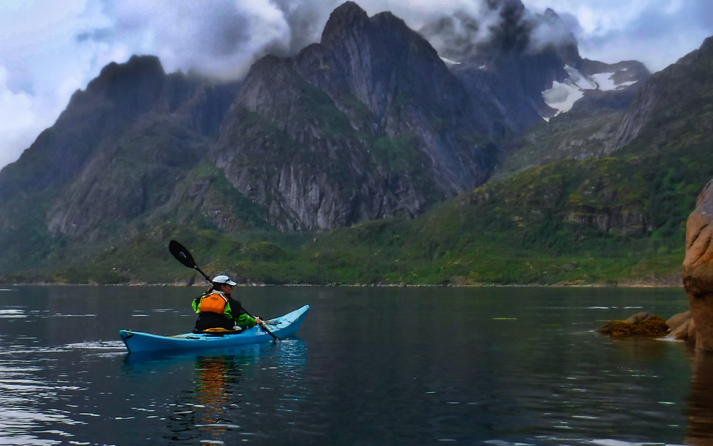 Sea Kayaking under mountains and glaciers