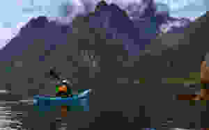 Sea Kayaking under mountains and glaciers