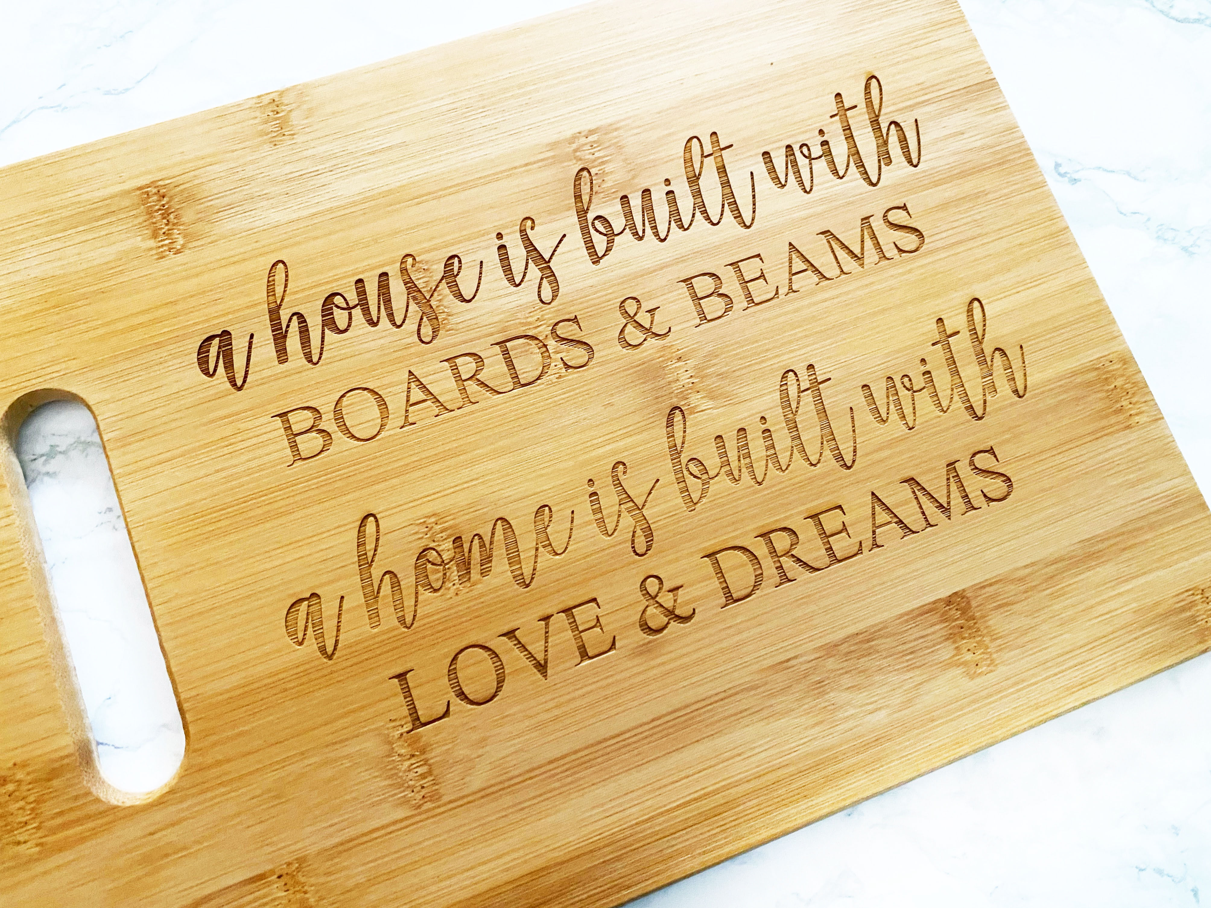 A house is built with Boards & Beams cutting board