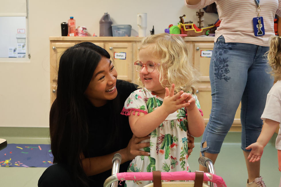 Behavior therapist working with a child in the preschool.