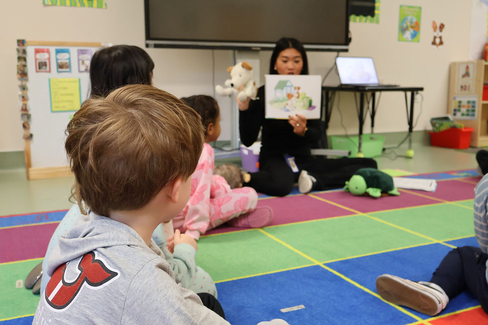 A behavior therapist working with a group of students.