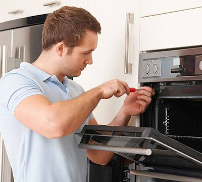 Technician repairing appliances and electronics