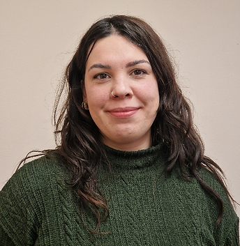 Woman with dark hair, smiling