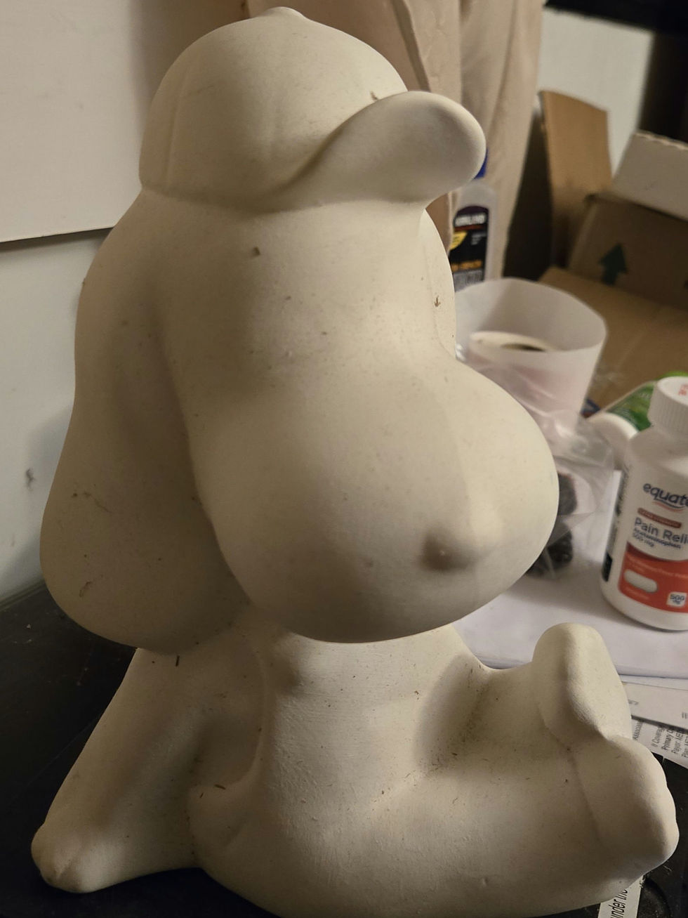 Snoopy wearing overalls and baseball cap 