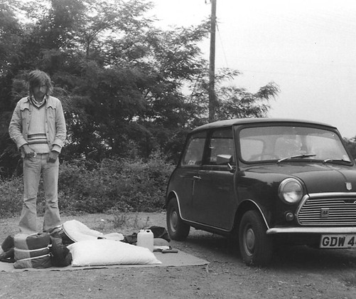 Mike Cook & his little black Triumph Her