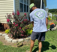 Weed eat and trim around home and business