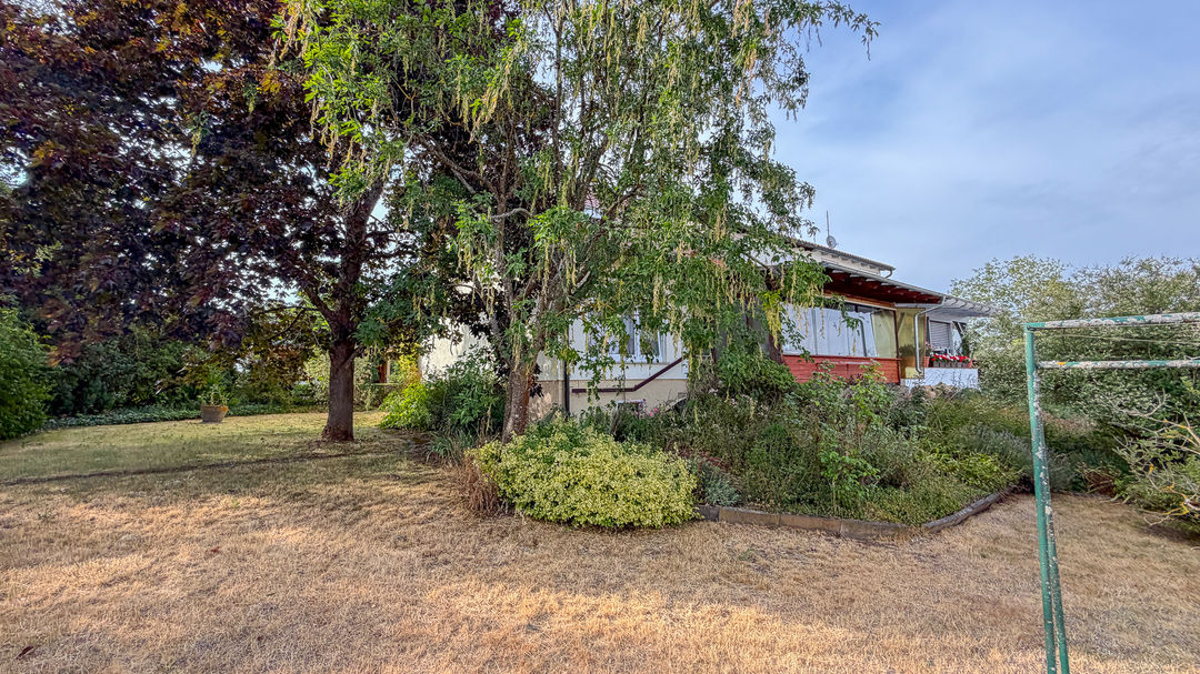 Doppelhaushälfte mit großem Garten und weiterem Entwicklungspotenzial – Foto 36