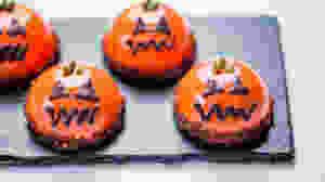 Pumpkin jack-o-lantern puddings served at bulgari hotel provide an idea for halloween themed sweets and pudding