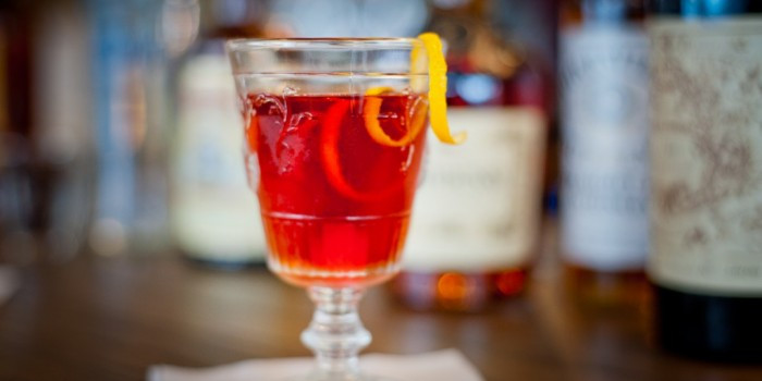 Old Fashioned cockail at riding house cafe with coil of orange rind