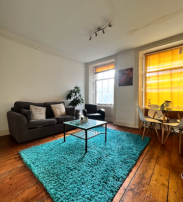 Spotless Airbnb kitchen ready for guests with gleaming countertops, clean appliances, and organized space