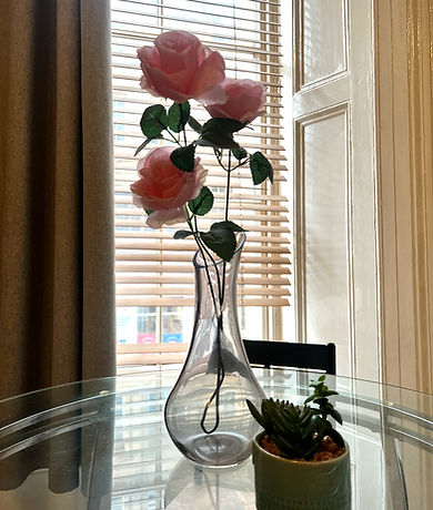 Guest-ready Airbnb bedroom with fresh linens, tidy decor, and a comfortable, clean atmosphere