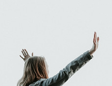 woman raising her hands_edited.jpg
