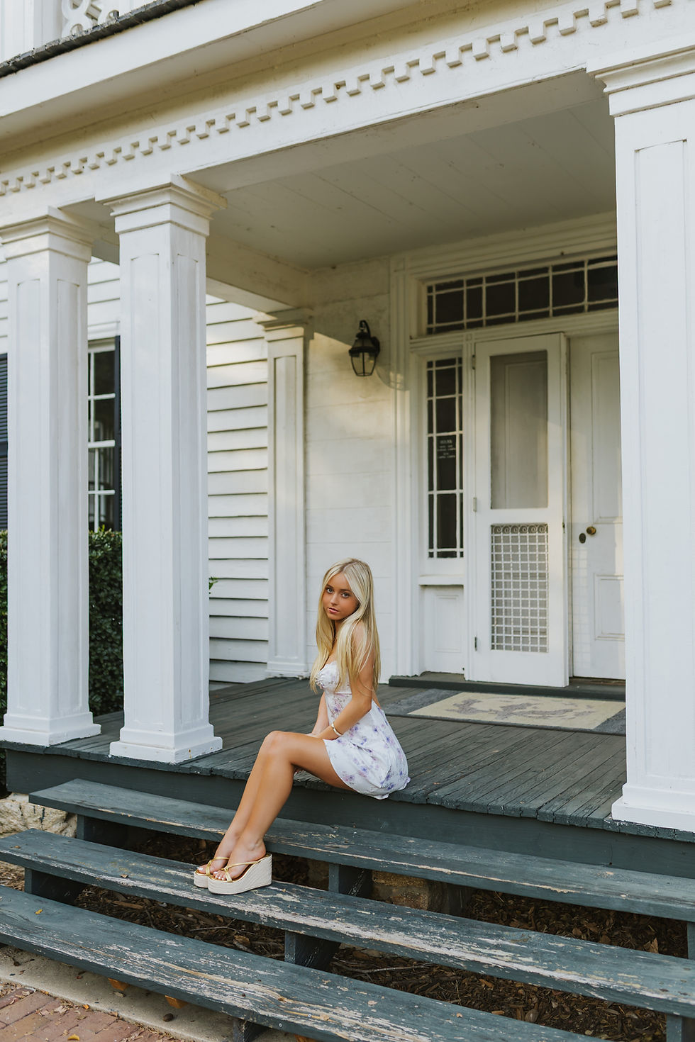 Blonde girl senior portraits in raleigh, north carolina class of 2026 graduate
