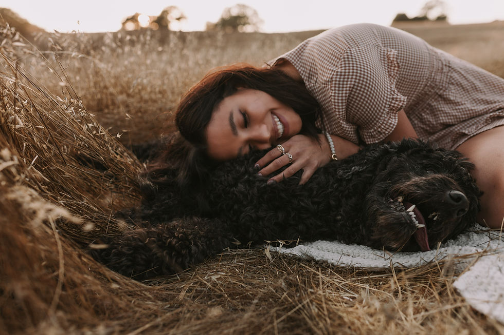 senior photos with a black puppy in wake forest, north carolina