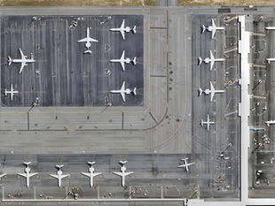 Planes parked on tarmac