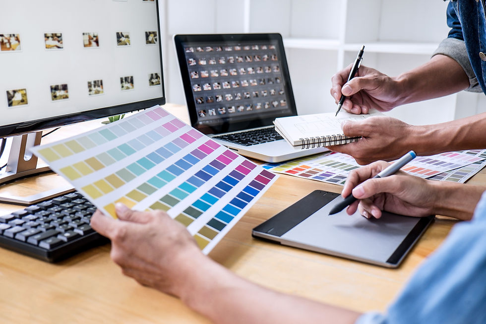 Close-up view of a vibrant logo design on a sketchpad