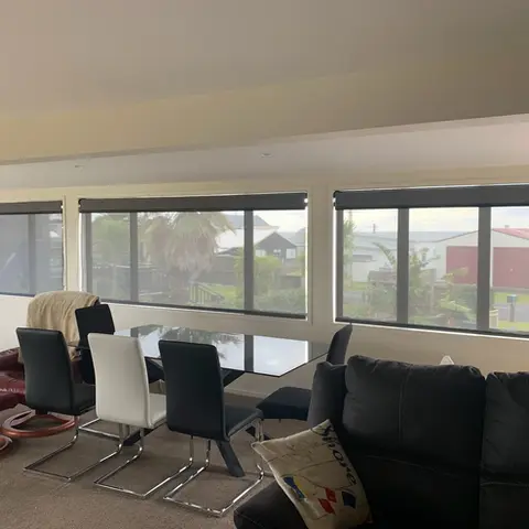 Double roller blinds fitted inside window jam in Pukehina