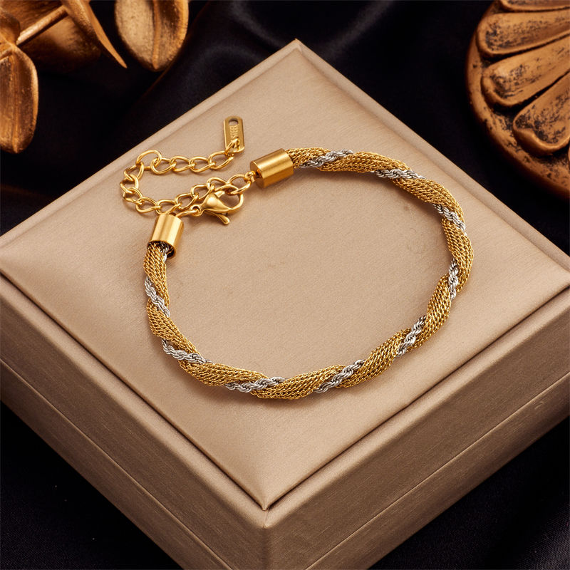 Thumbnail: Women's gold charm bracelet collection in 316L stainless steel with heart, butterfly and textured link designs