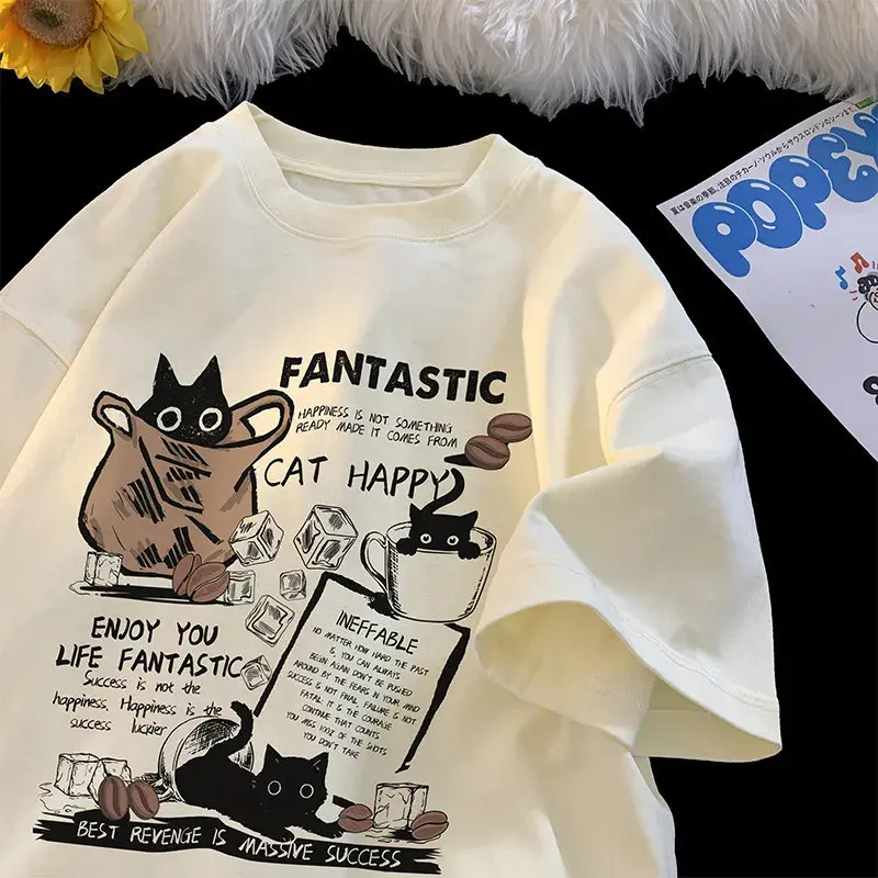 Women's oversized cartoon cat graphic t shirt in cream with playful printed design