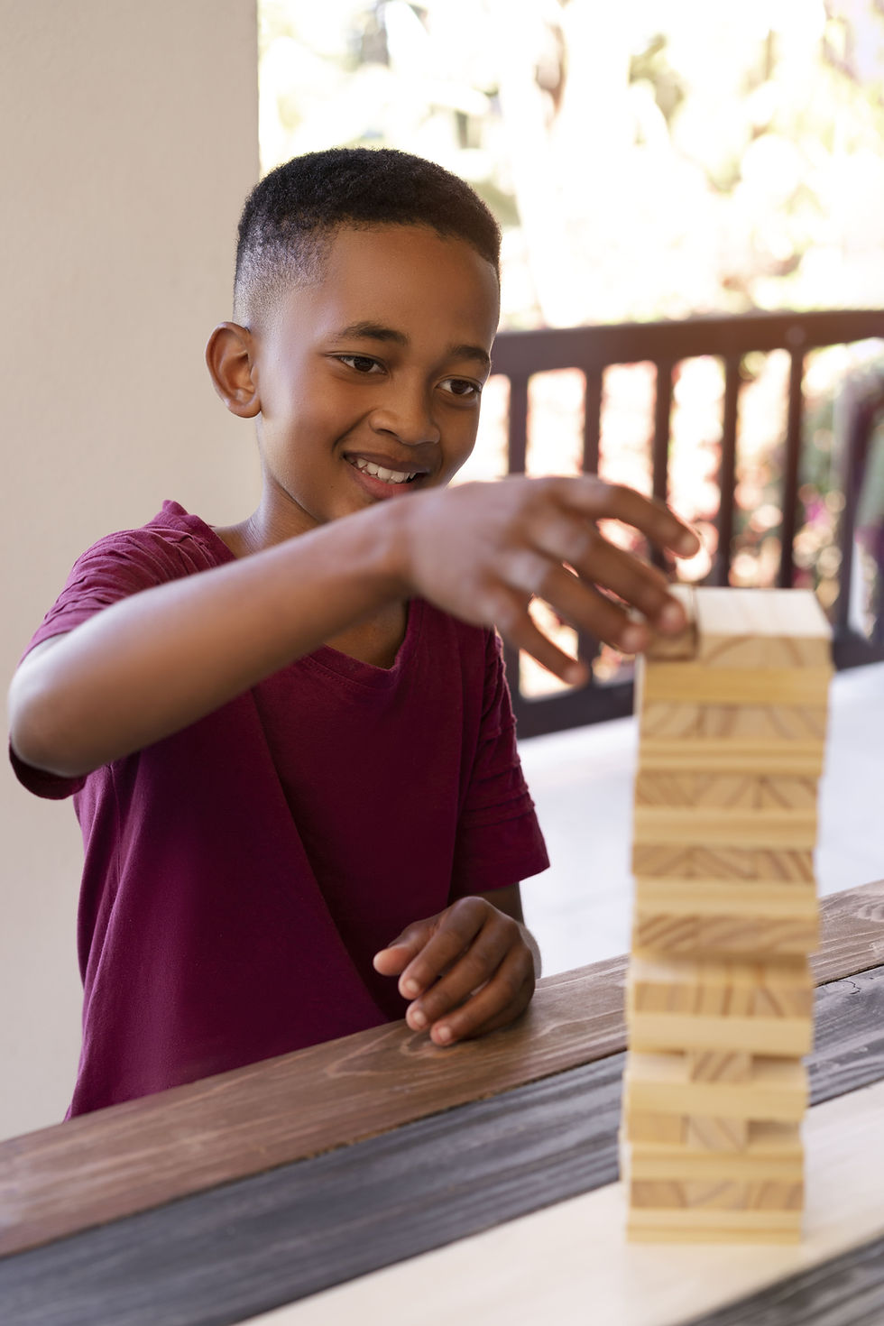 young-boy-having-fun-while-playing-with-his-family.jpg