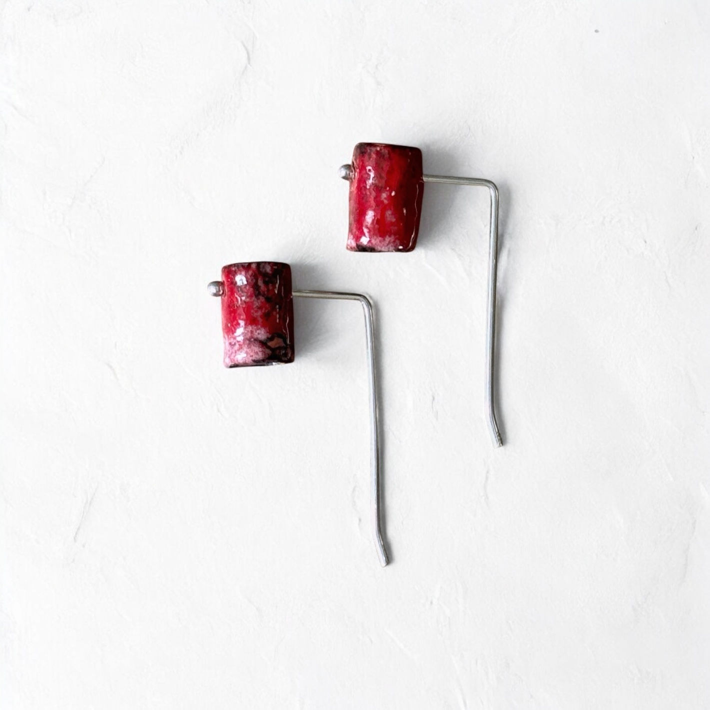 “Petit Pan” enamel on copper and silver earrings