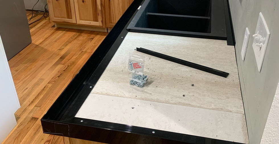 Concrete countertop forms. Floating shelves bracing in the background.