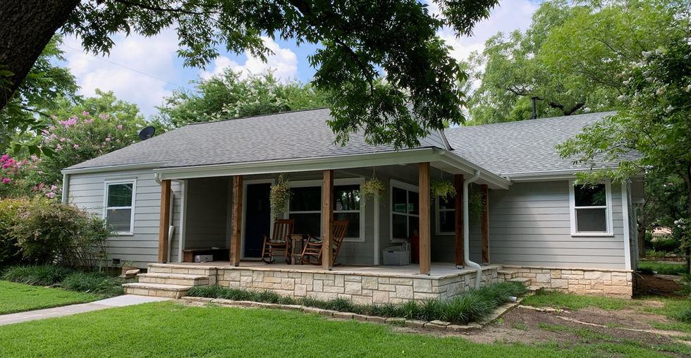 Front Porch and new Exterior Elevation. Cedar posts and gray siding.