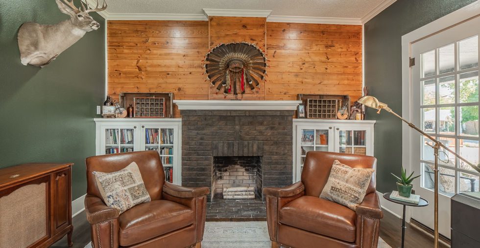 Office with leather chairs.