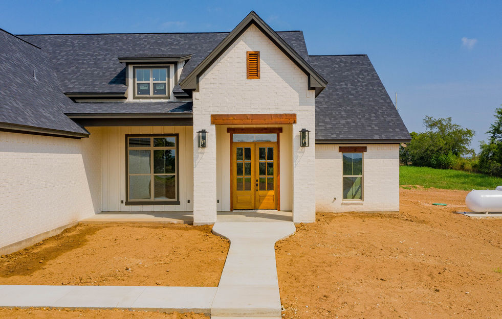 Front door and approach of Timber Hills home