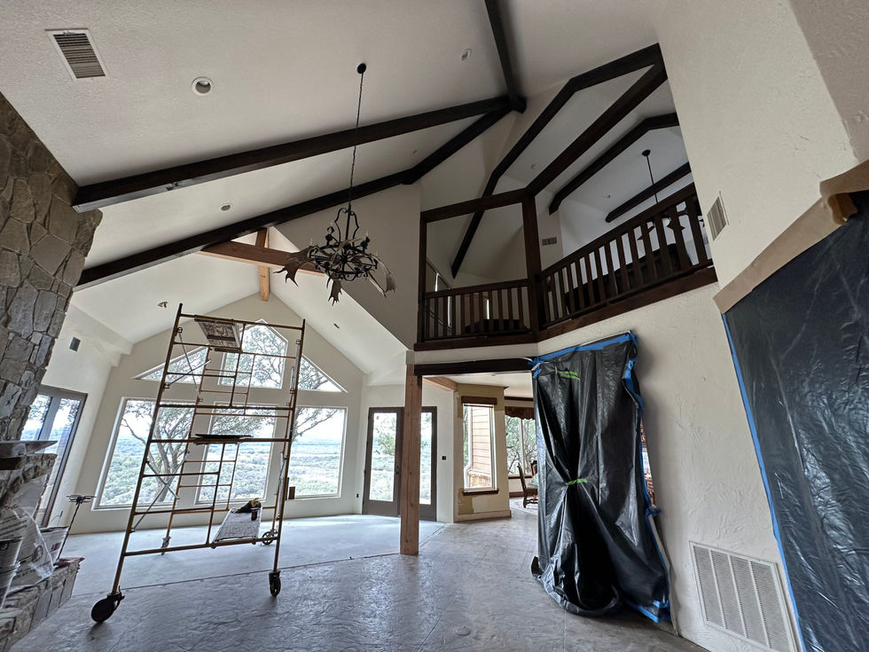 a large room with a chandelier hanging from the ceiling
