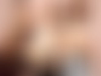 Ladies take a photo in the booth