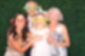 A family poses for the Open Air Booth