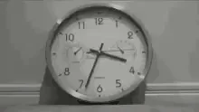 a clock that keeps moving its hands endlessly in a gif format
