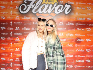Friends enjoy the photo booth at Pierclub Taste of Oside event activation