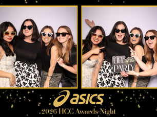 Asics employee pointing and having fun on a awards ceremony print layout