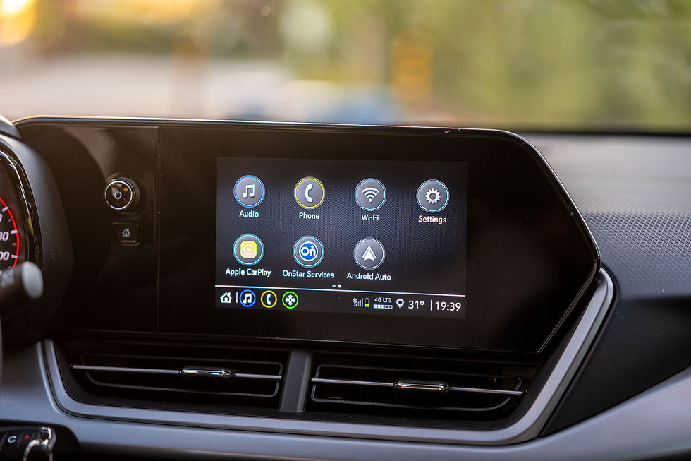 2026 Chevrolet Trax 1 RS - Car dashboard infotainment screen showing Audio, Phone, Wi‑Fi, Settings, Apple CarPlay, OnStar Services, Android Auto, 31° and 19:39