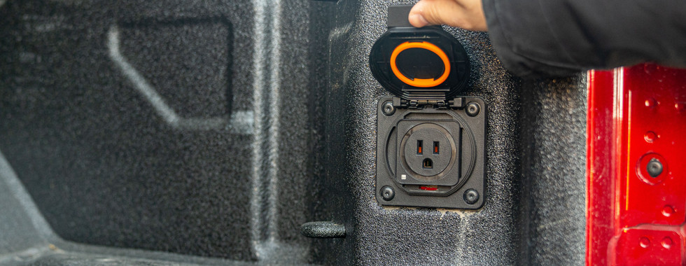 GMC Sierra 2500 HD AT4X AEV trunk plug 110V