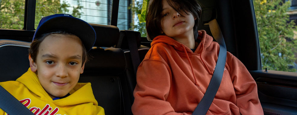 GMC Sierra 2500 HD AT4X AEV back seats with kids
