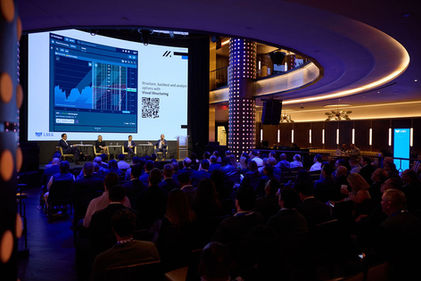 Packed auditorium for corporate tech conference – Raised Media Co