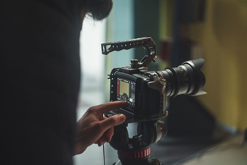 vecteezy_hand-adjusting-cinema-camera_1864606.jpeg