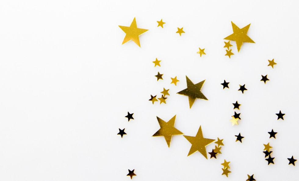 Gold stars on a white background