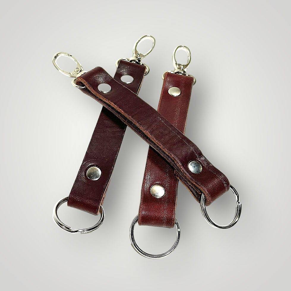 Three latigo leather keyring and snap belt clips.