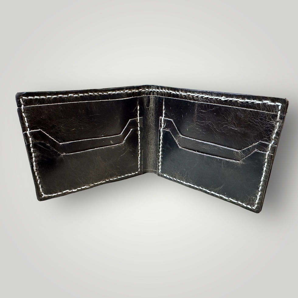 Thumbnail: The inside view of a black pull up leather bi-fold wallet with white hand stitched thread that shows the card slots on the left and right side along with the bill fold.