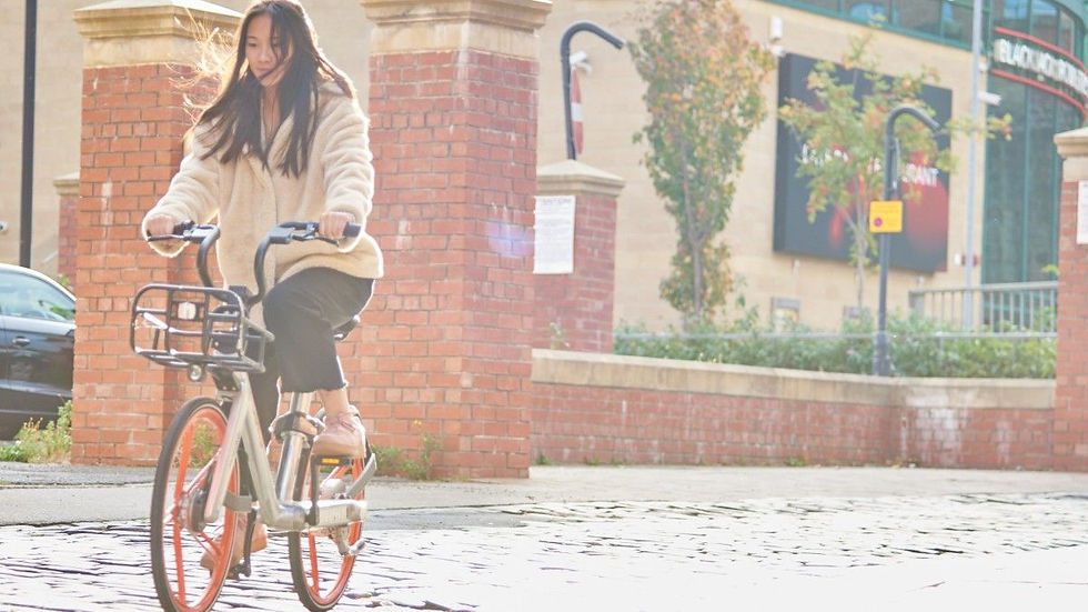 Woman cycling in Newcastle