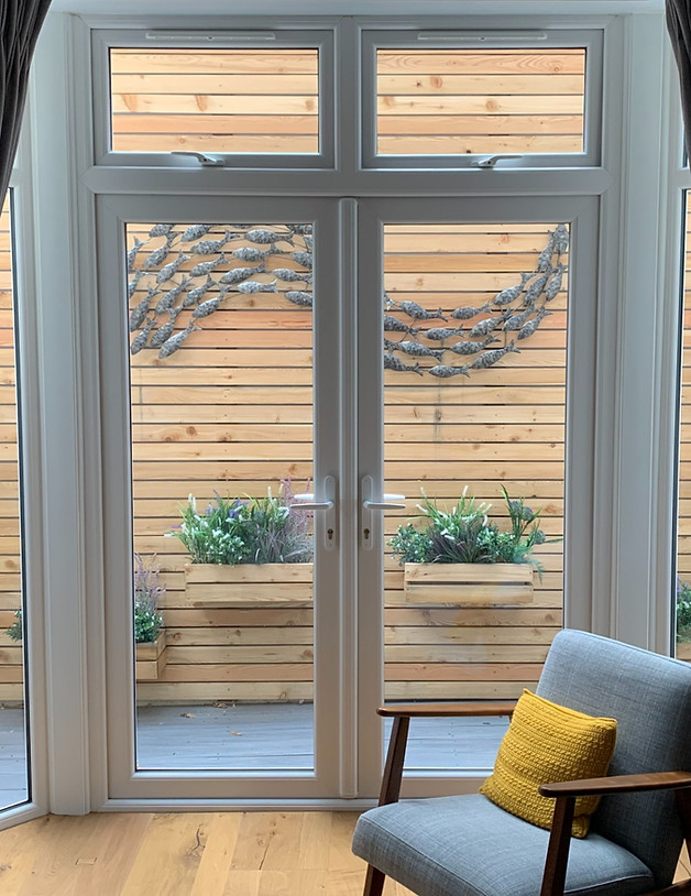 Larch Slatted wall, garden sculpture