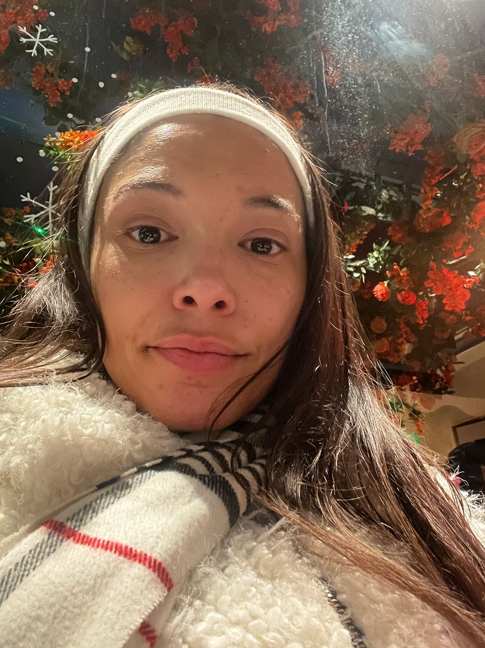 Close-up view of a bottle of hydrating skin serum on a wooden surface